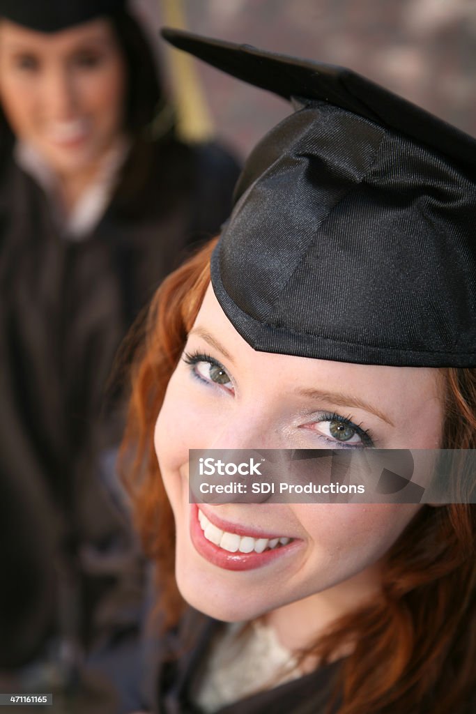 Happy Female Graduate and her friends Happy Female Graduate and her friends.  20-29 Years Stock Photo