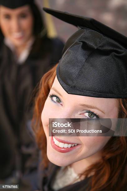 Happy Female Graduate And Her Friends Stock Photo - Download Image Now - 20-29 Years, 2009, Achievement