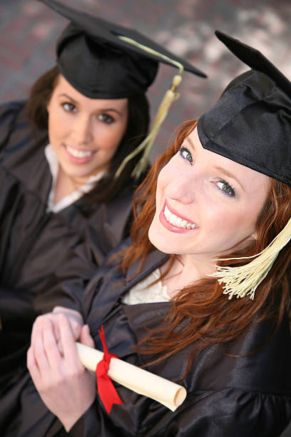 Happy Female Graduates Holding Her Diploma