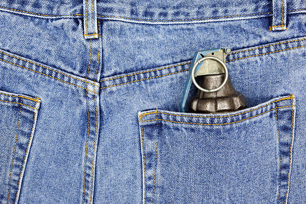 istock Hand Grenade in Jeans Pocket 471161877