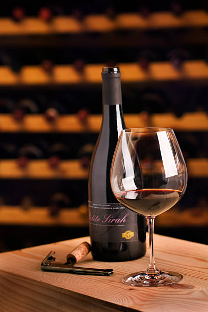 istock Winetasting Red Wine Glass with Bottle, Corkscrew for Cellar Tasting 471162463