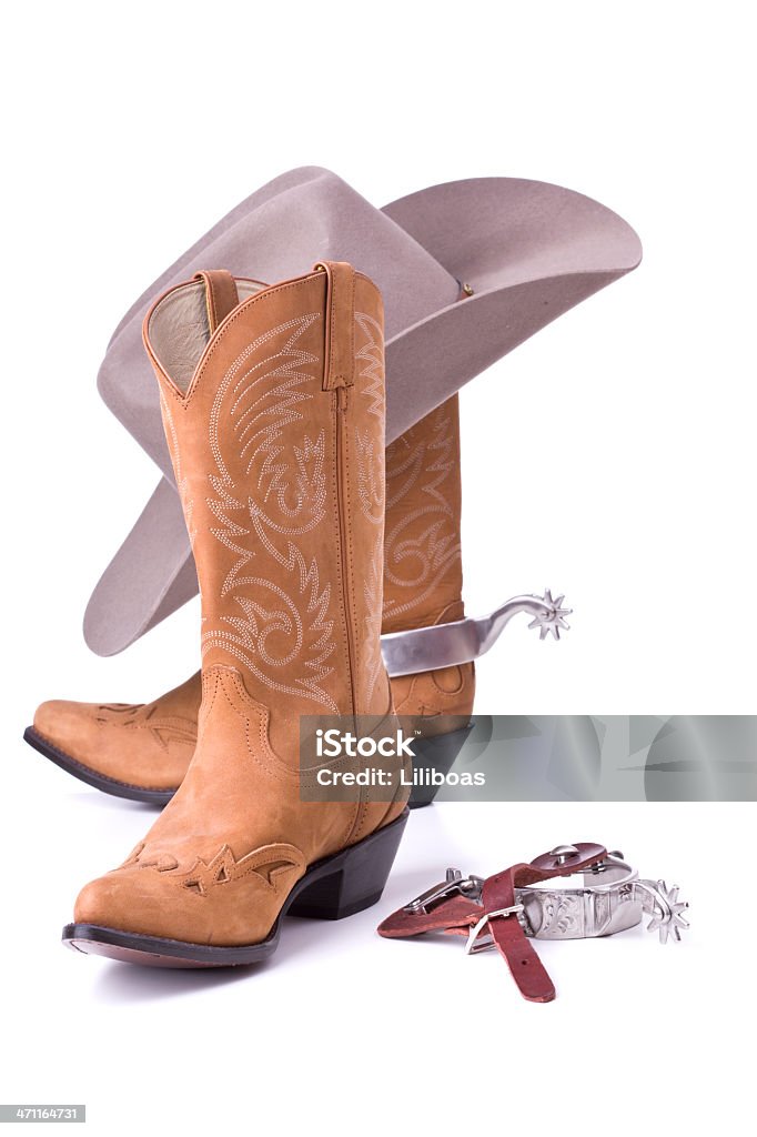 Des bottes de cow-boy et Spurs - Photo de Bottes libre de droits