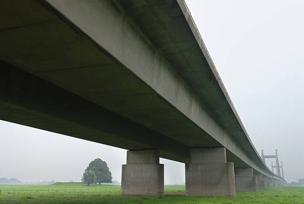 istock Bridge looming from the mist 471165153