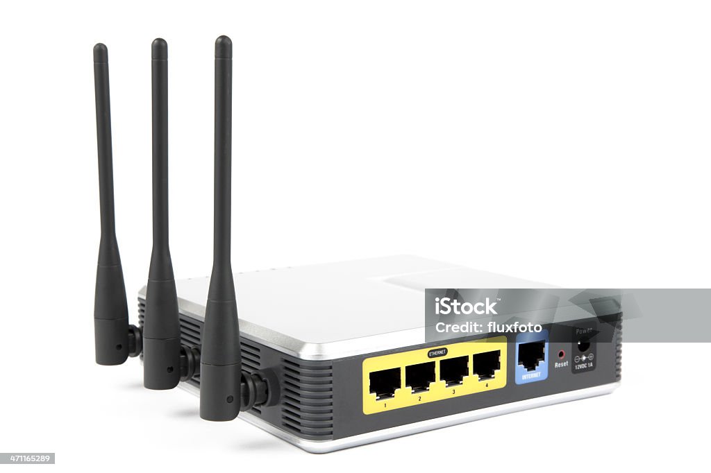 Wireless modem router Modern broadband G wireless router, isolated on white with clipping path.  Canon 5D Mk2.  Please visit my Consumer Electronics Lightbox for more similar photos Router Stock Photo