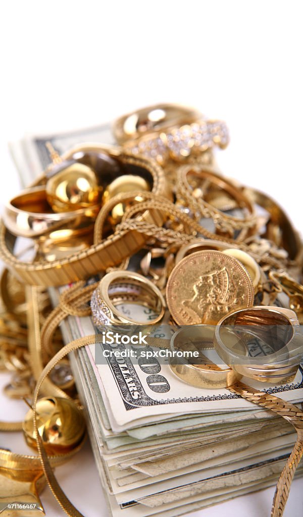 Ferraille Gold sur Pile d'argent - Photo de Bijou libre de droits