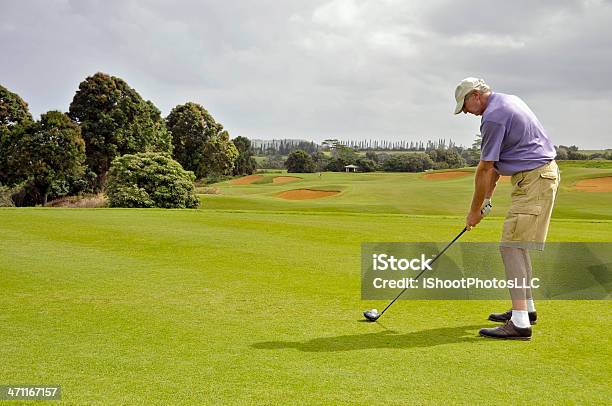 Left Handed Senior Golfer Stock Photo - Download Image Now - Golf, Left Handed, Active Seniors