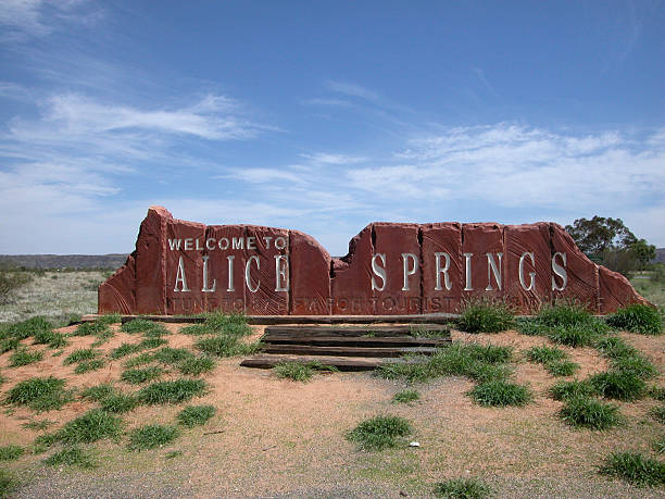 Alice Springs sign The public sign at the entrance to the town of Alice Springs in the dead centre of Australia. alice springs photos stock pictures, royalty-free photos & images