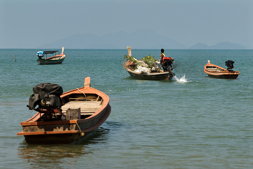 Traditional Asian sea gypsy fishing boats.