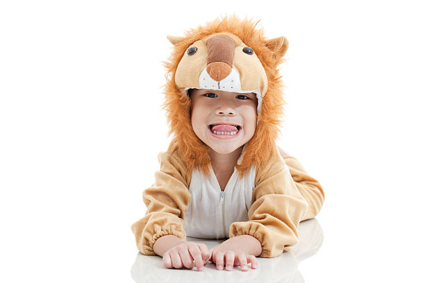 istock Cute little boy dressed in lion suit 471168732
