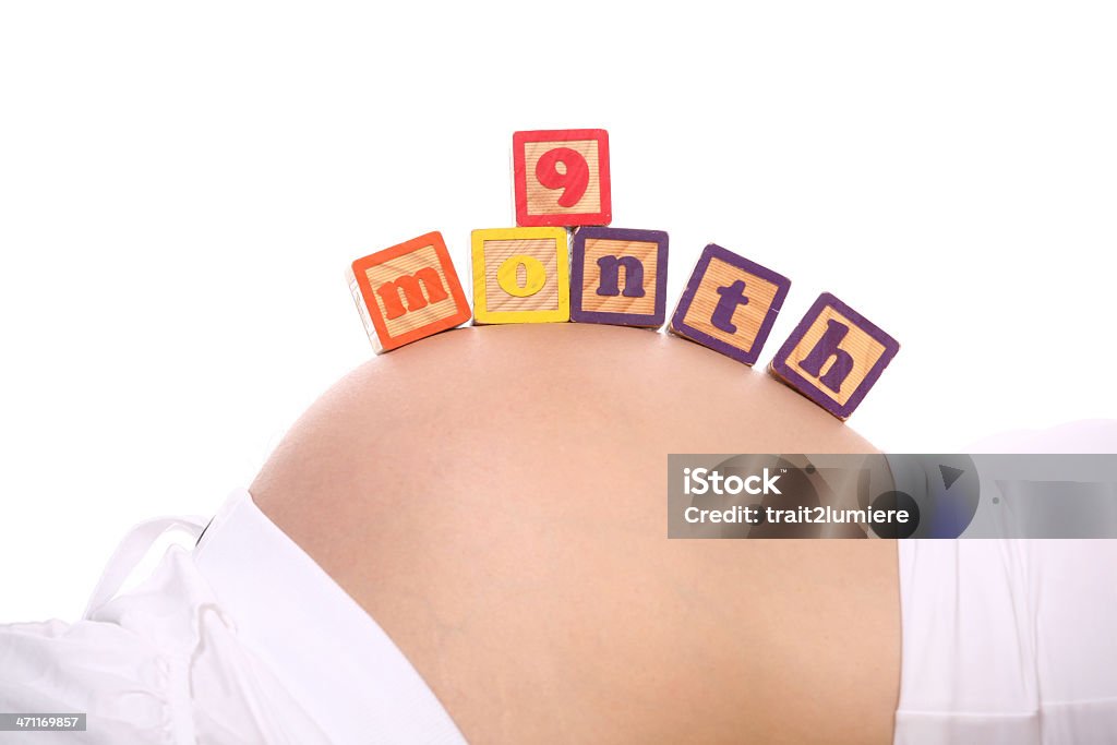 Neuf mois de grossesse - Photo de Mois libre de droits