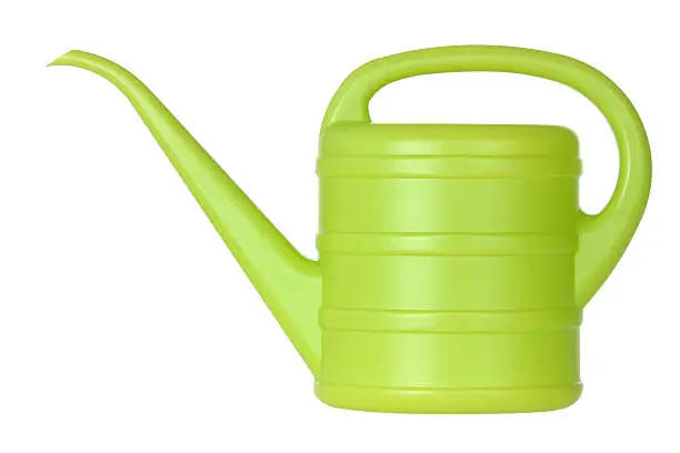 Green bailer is tool for watering on the white background.
