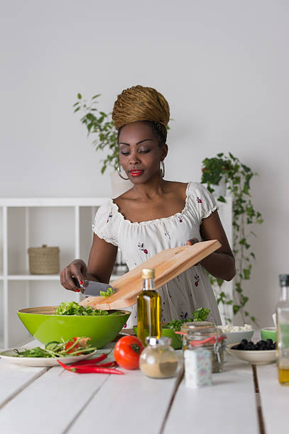 istock Woman chopping vegetables for salad 471171646