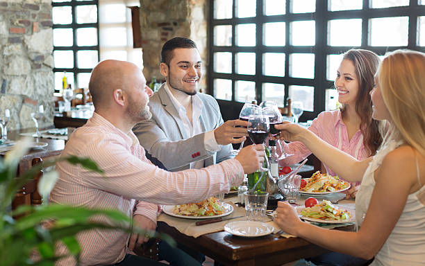 istock Young people enjoying food at tavern 471171948