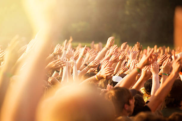 istock Hands Up during an Outdoor Concert 471172418