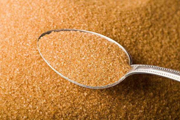 Raw cane sugar stock photo