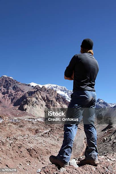 Man Hiker Looking At The Mount Aconcagua Summit Argentina Stock Photo - Download Image Now