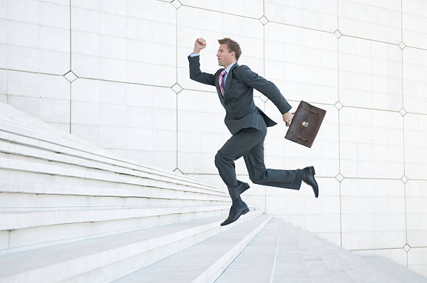 istock Hurrying Up the Staircase to Success 471175959