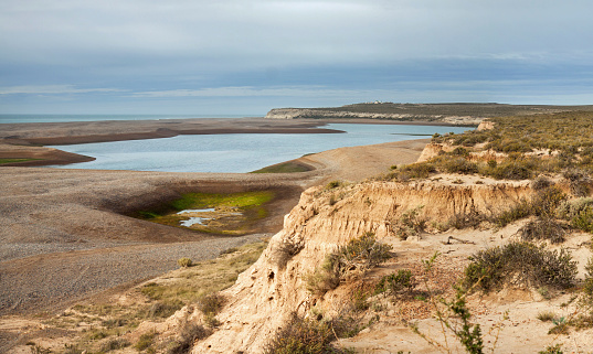 Peninsula Valdes, Chubut, Argentina: the point where Caleta Valdes, a 35 km long lagoon, enters the Atlantic Ocean; the emptyness of the Patagonian landscape in winter is visible.