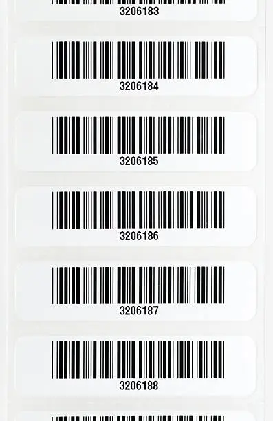 Row of bar code stickers on a white background.