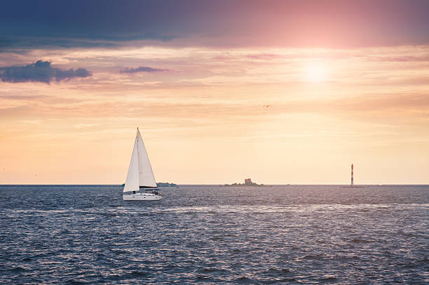 istock Yacht in the sea at sunset. 471176740