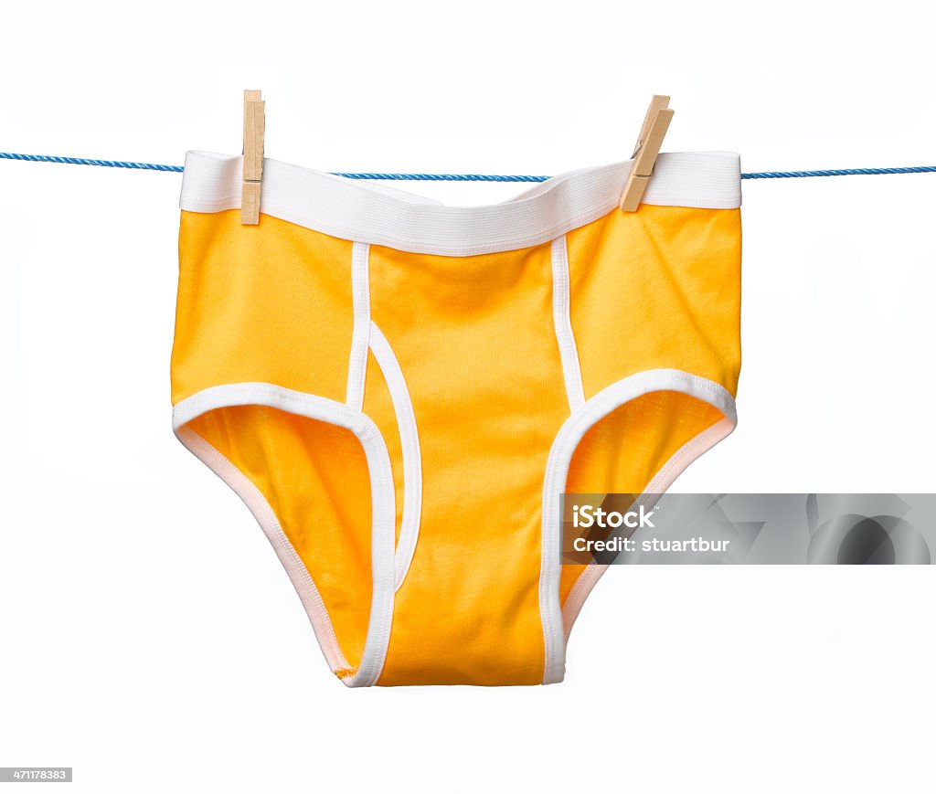 yellow pants pants hanging from washing line Yellow Stock Photo