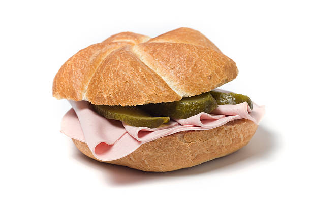 istock Bun with sausage, typical Austrian snack, isolated on white. 471179269
