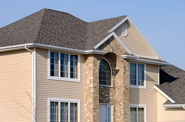 istock Home With Vinyl Siding, Brick Facade,  Architectural Asphalt Shingle Roof 471180949