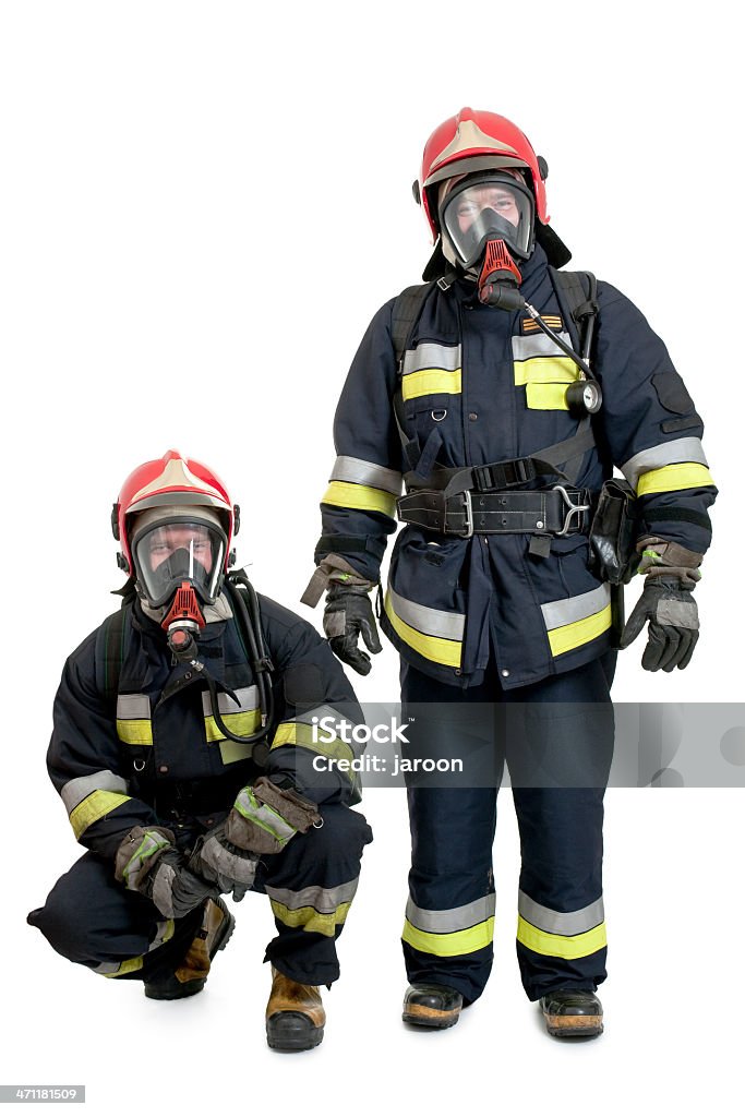 two firemen two firemen isolated on white Firefighter Stock Photo