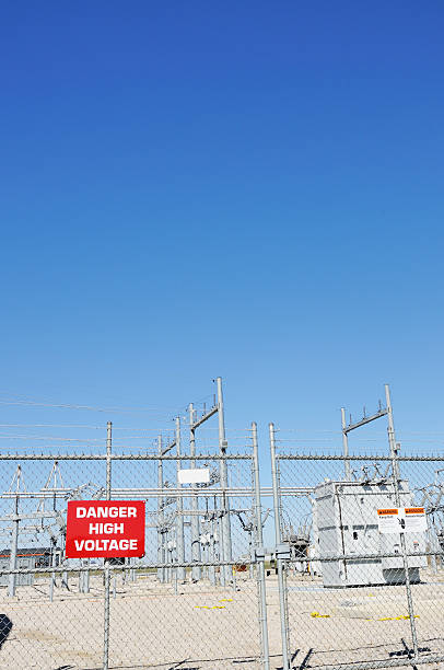 istock Danger High Voltage Sign at Electrical Substation 471181767