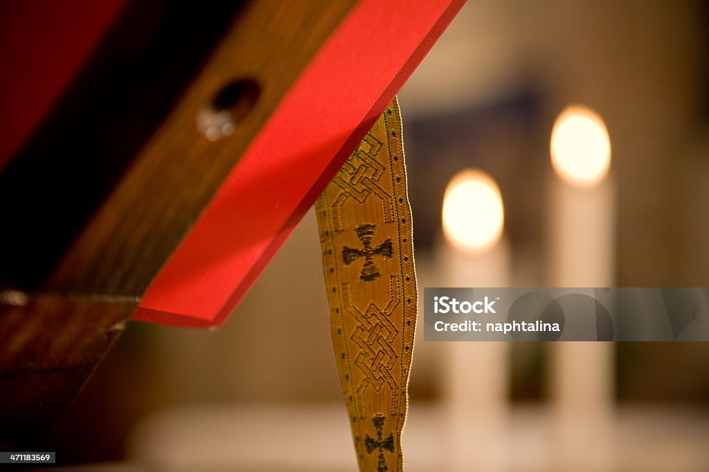 Mass book. Detail of a christian Mass book, bookmark with small christian cross. Bible Stock Photo