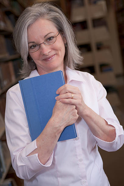 istock Woman in Library Series (XXL) 471183621