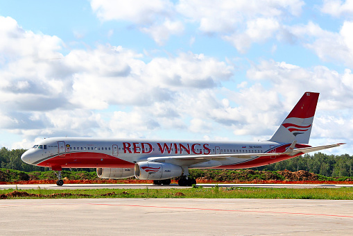Moscow, Russia - June 4, 2012: Red Wings Airpines Tupolev Tu-204 parked at the Vnukovo International Airport.