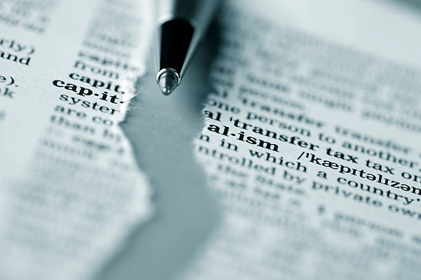 istock Ripped dictionary page series: capitalism 471185259