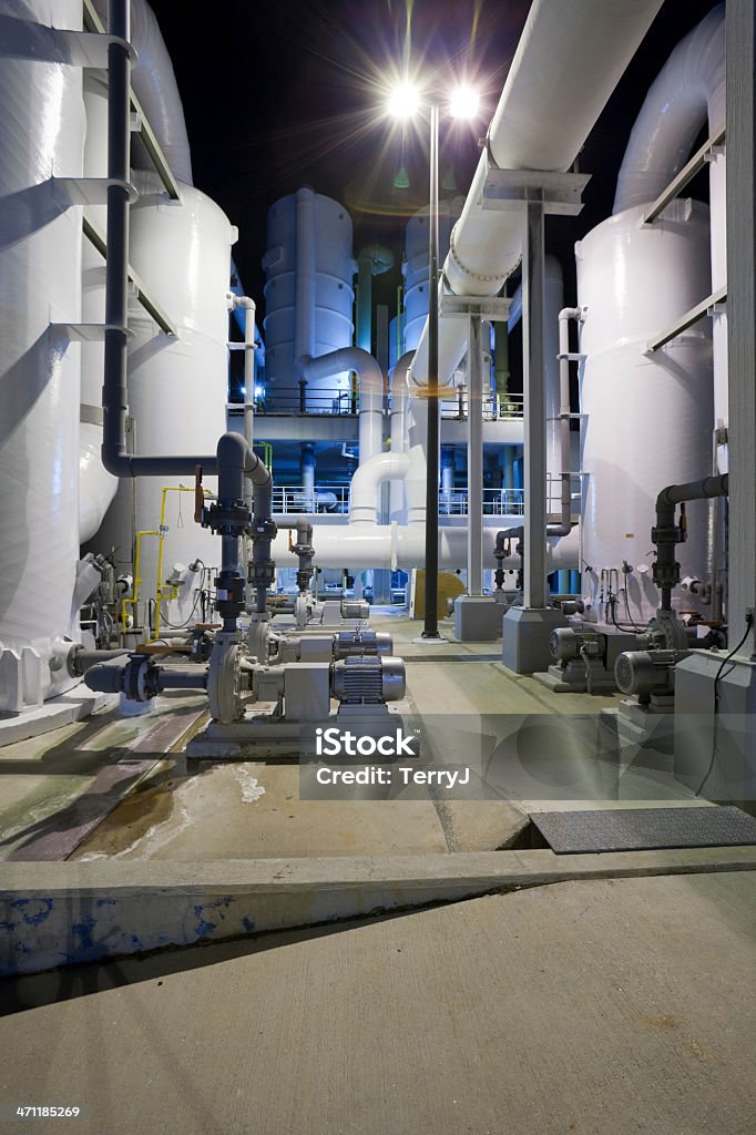 Degassification Night time shot of a degassification water system at a public water utility company. Electric Motor Stock Photo