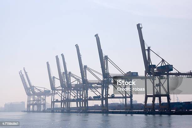 Cranes In Barcelona Harbor Stock Photo - Download Image Now - Barcelona - Spain, Business Finance and Industry, Clear Sky