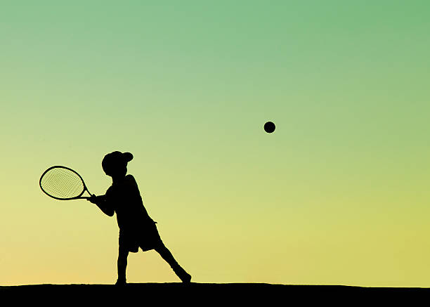 Black Leather Tennis Rackets And Balls With Gold Details On Black Background. Sport Content.