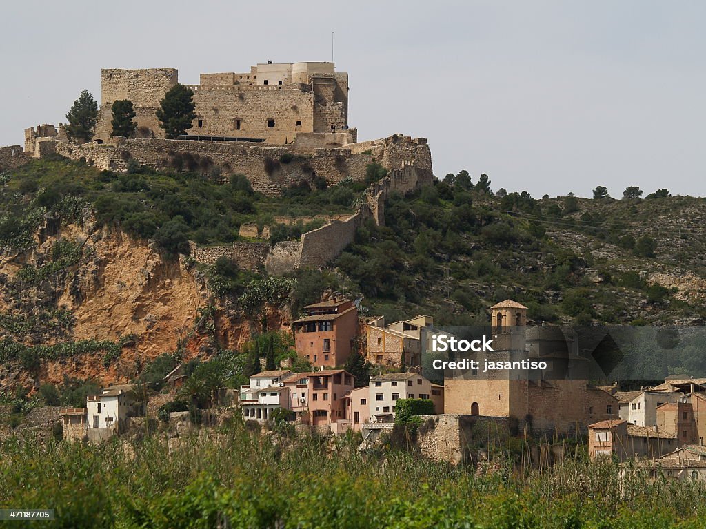 Miravet This is a mediterranean town called Miravet, with a medieval templar castle on the top of the hill. Ancient Stock Photo