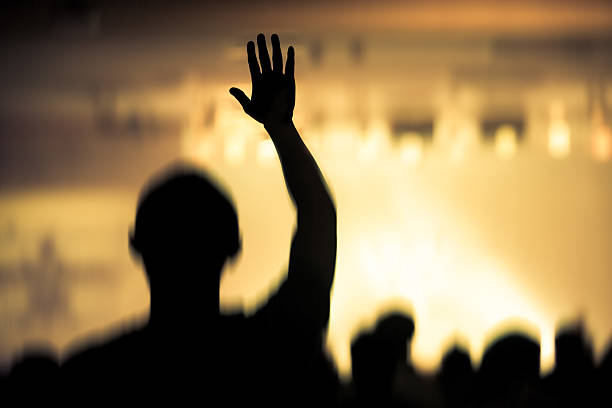 istock christian music concert with raised hand 471187940