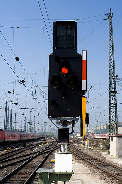 istock Stop sign / Traffic light at the railroad track 471188247