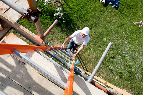 Builders Using Ladders 16,200+ Ladder Construction Site Stock Photos, Pictures & Royalty-Free ...