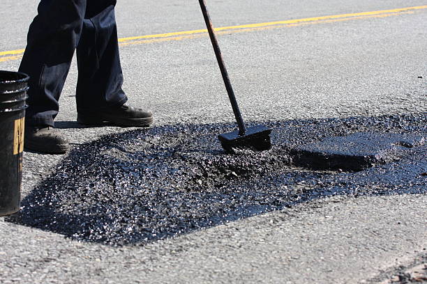 istock Pot Hole Repair, Series 471188859