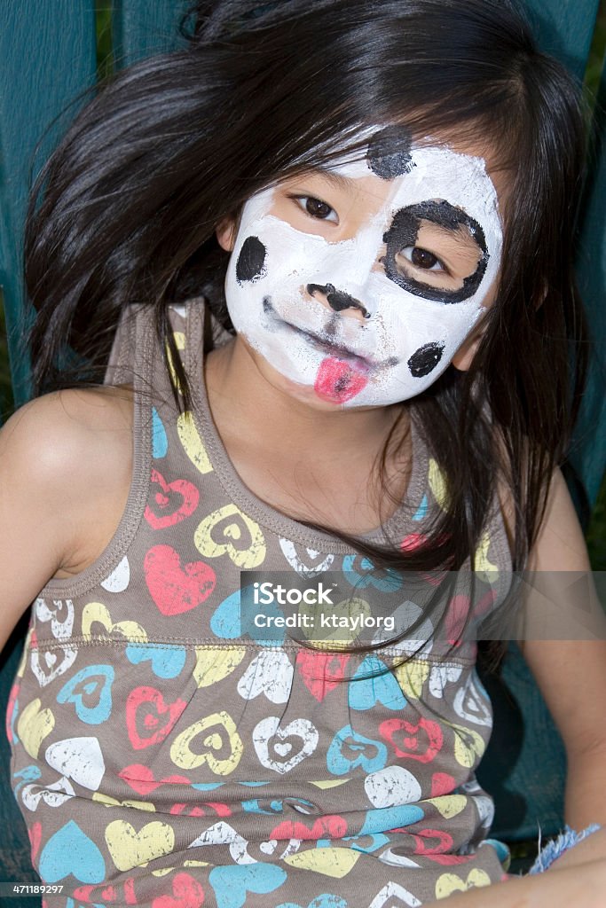 Niña con pintura de la cara - Foto de stock de 6-7 años libre de derechos