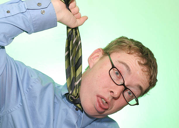 istock Businessman Hanging Himself with Necktie 471189549