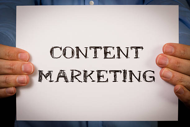 istock Man with Content Marketing sign 471191562