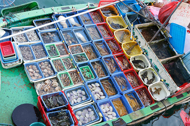 Selling fresh seafood from the boat at Sai Kung, Hong Kong