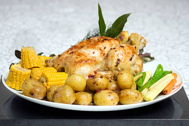 roast chicken with vegetables stock photo