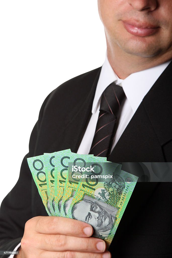 Traje de negocios y Australian 100 billetes de dinero en efectivo en dólares - Foto de stock de Billete de dólar australiano libre de derechos