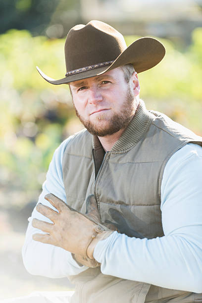 istock Close up of man working on farm 471194794