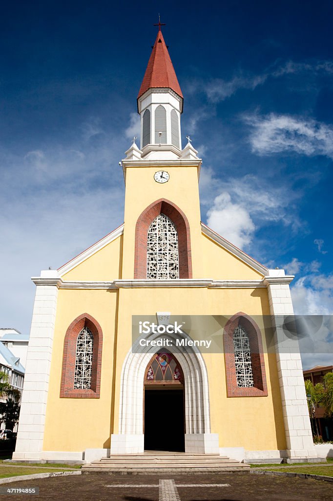 Cathedral Notre Dame de Papeete Catholic Church Tahiti Island Cathedral Notre Dame de Papeete (built in 1875) historic catholic church against blue summer sky. Papeete,Capital of Tahiti, French Polynesia. Ancient Stock Photo