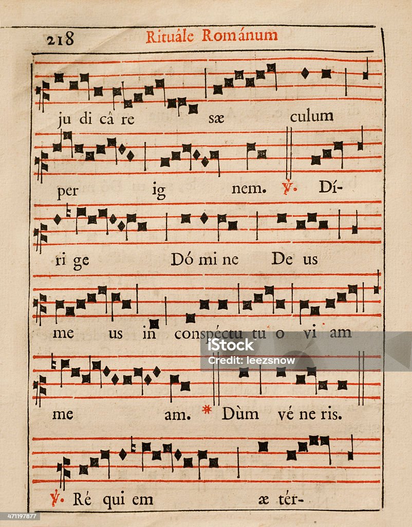 Antique Sheet Music A page of music notation from an antique book of Christian Gregorian Chants. Medieval Stock Photo